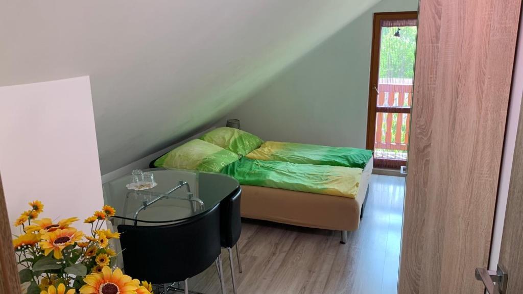 Postel nebo postele na pokoji v ubytování Penzión Gaboltov
