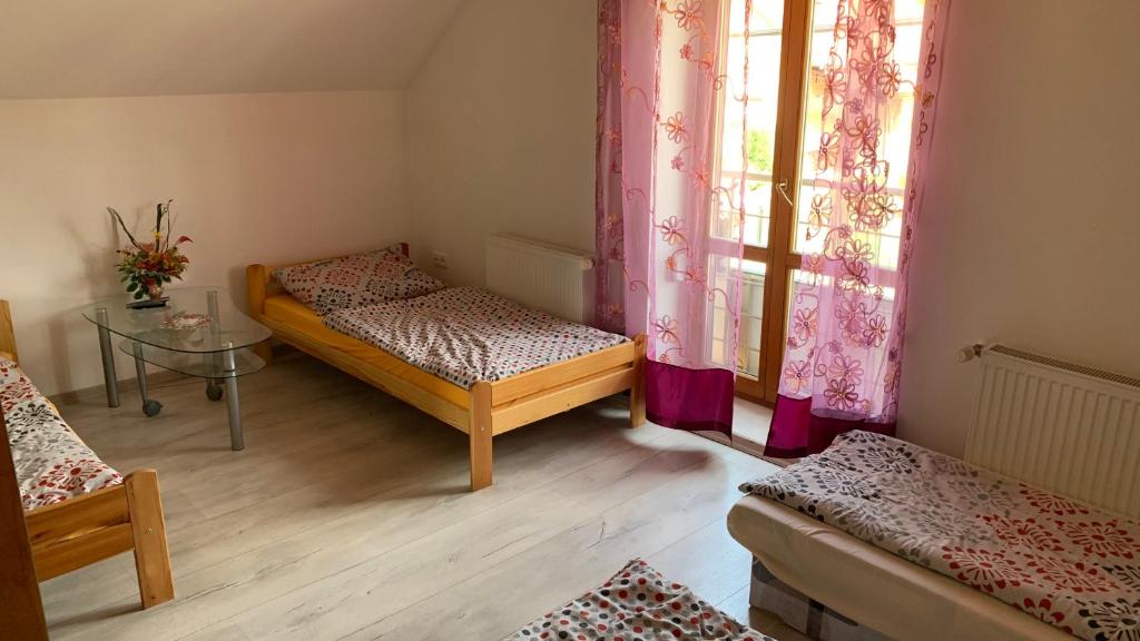 Postel nebo postele na pokoji v ubytování Penzión Gaboltov