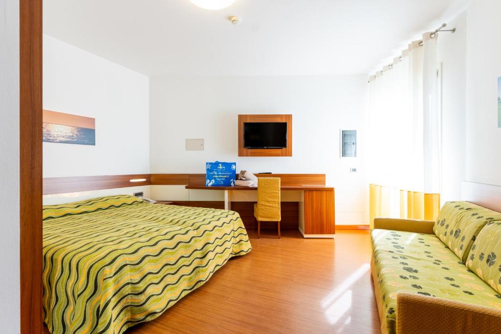 Postel nebo postele na pokoji v ubytování Hotel Maregolf