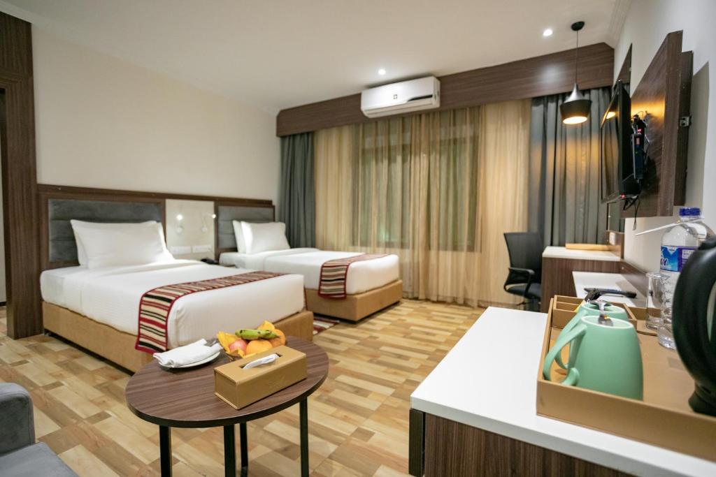 Postel nebo postele na pokoji v ubytování Hotel Starlight