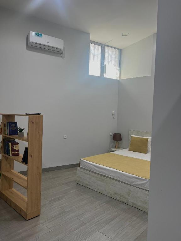 Postel nebo postele na pokoji v ubytování Hotel Menua
