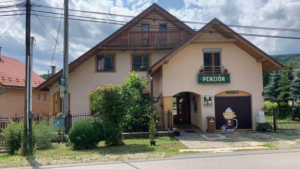 a house with a sign that reads pension at Penzión Gaboltov in Gaboltov