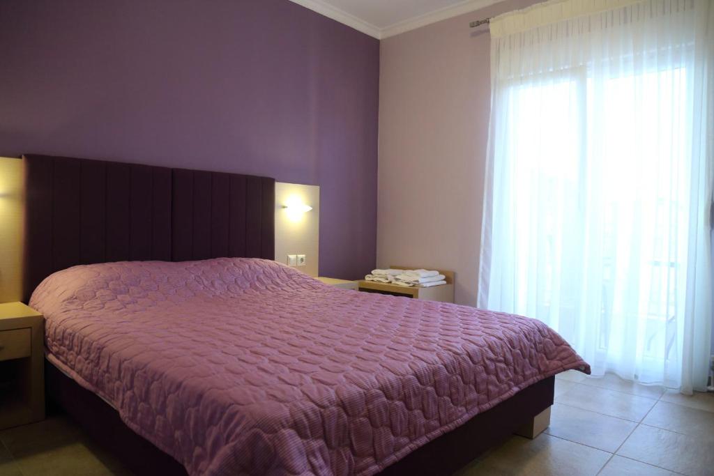 Postel nebo postele na pokoji v ubytování Hotel Souita