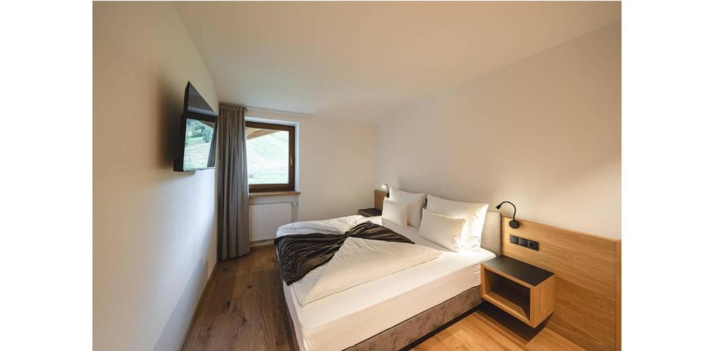 Postel nebo postele na pokoji v ubytování Hotel Lahnerhof