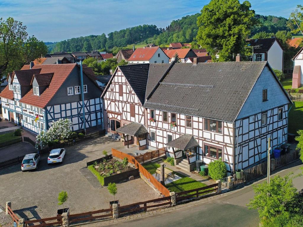 an aerial view of a town with buildings and cars at Holiday home in ldernTwistetal Oberwaro with sauna in Oberwaroldern