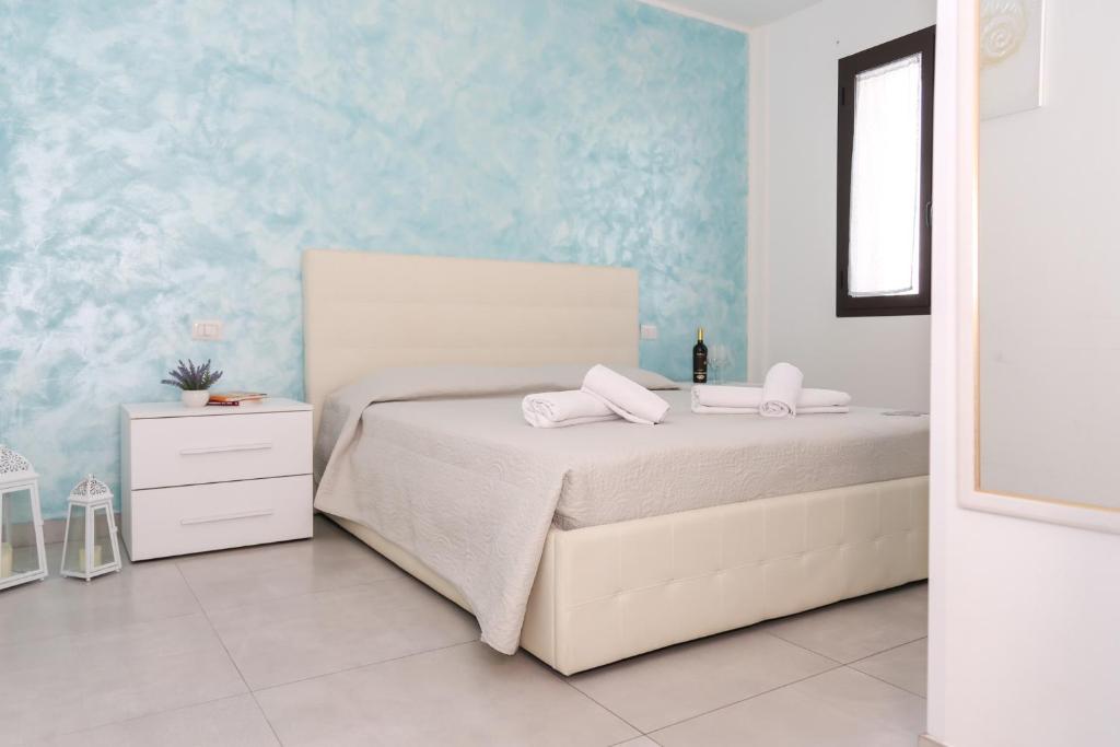 Postel nebo postele na pokoji v ubytování Il Sorriso B&B