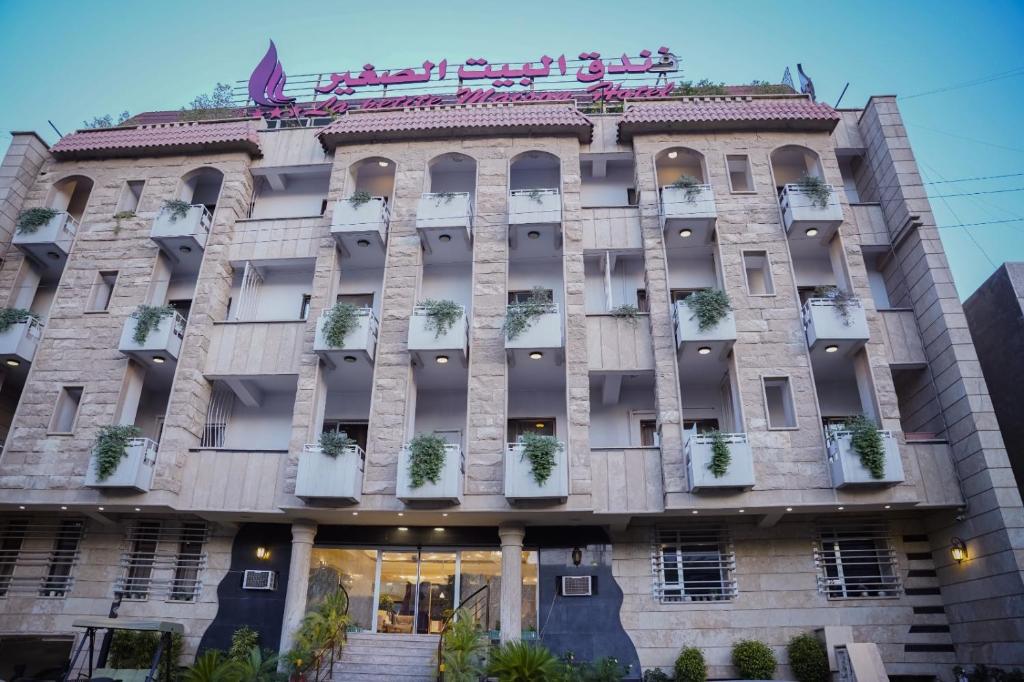 El hotel boutique akritkritkritkritkritkrit está situado en la ciudad. en فندق البيت الصغير - Lapetite Maison Hotel en Bagdad