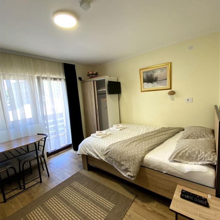 Postel nebo postele na pokoji v ubytování Vila Mirjana Tara