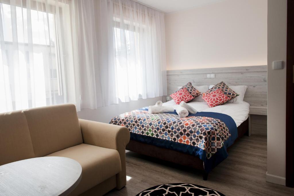 Posteľ alebo postele v izbe v ubytovaní Villa Andalucia SPA & Leisure