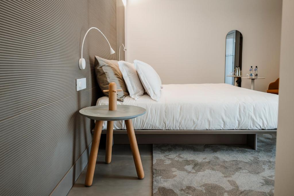 Postel nebo postele na pokoji v ubytování Biancodonda Greenblu Hotel & SPA
