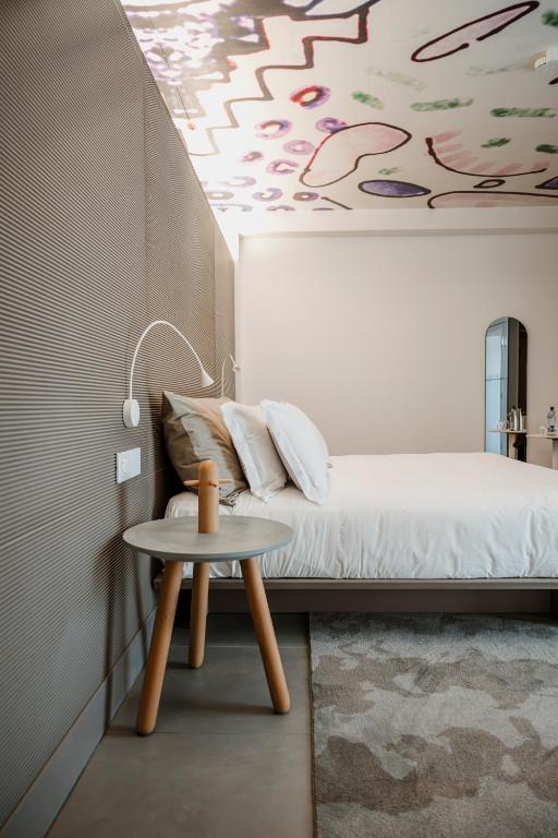 Postel nebo postele na pokoji v ubytování Biancodonda Greenblu Hotel & SPA