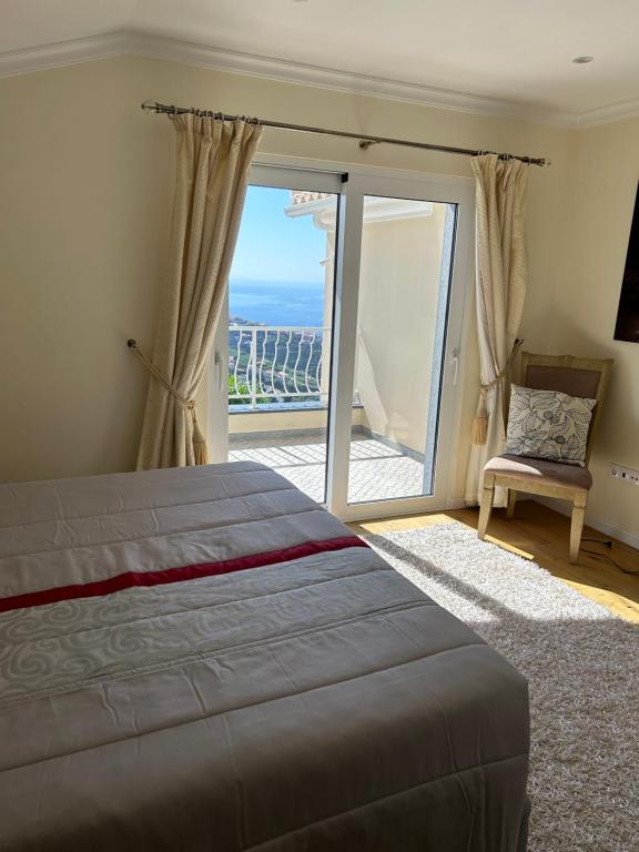 Postel nebo postele na pokoji v ubytování Casa Del Mar