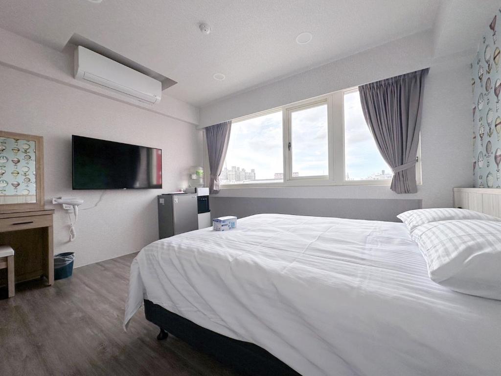Cama o camas de una habitación en 夢境旅-智能自助旅店