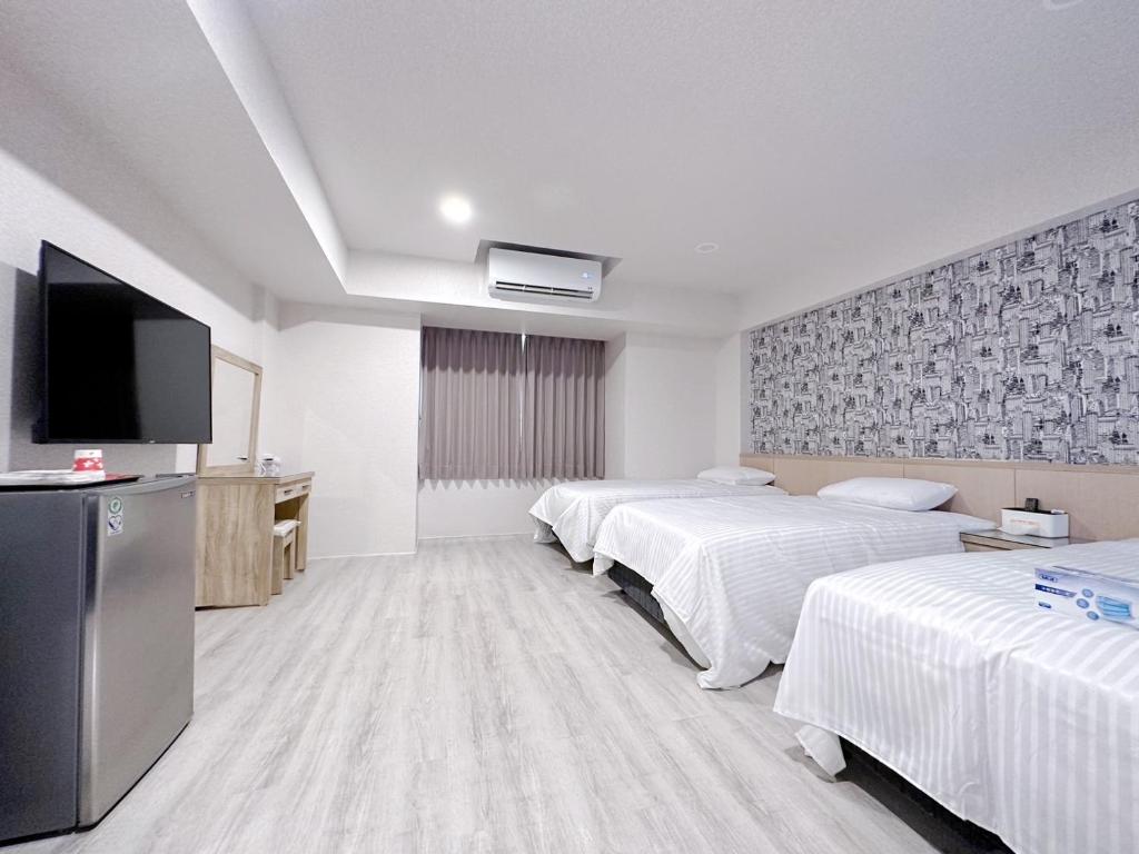 Cama o camas de una habitación en 夢境旅-智能自助旅店