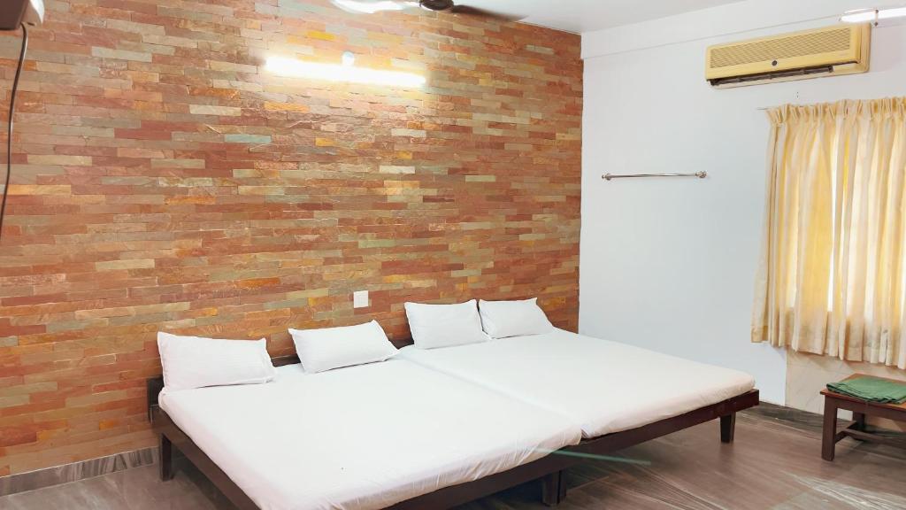 Postel nebo postele na pokoji v ubytování PPG HOMES