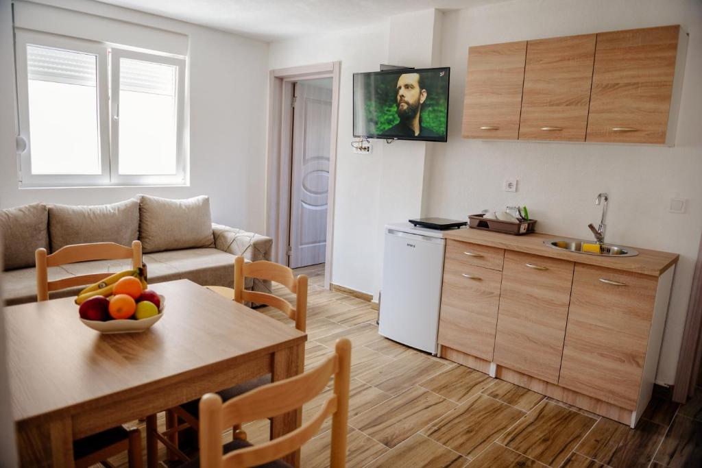 Kuchyň nebo kuchyňský kout v ubytování Premium Apartments