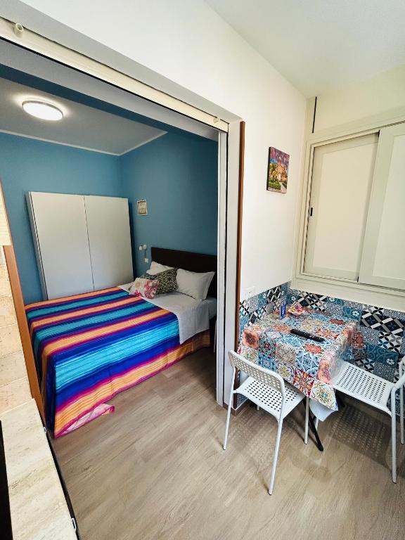 Posteľ alebo postele v izbe v ubytovaní SicilyHouse Palermo