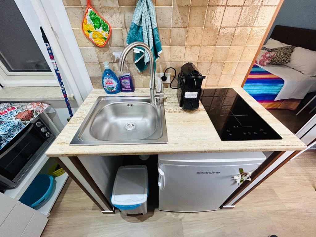 Kuchyňa alebo kuchynka v ubytovaní SicilyHouse Palermo