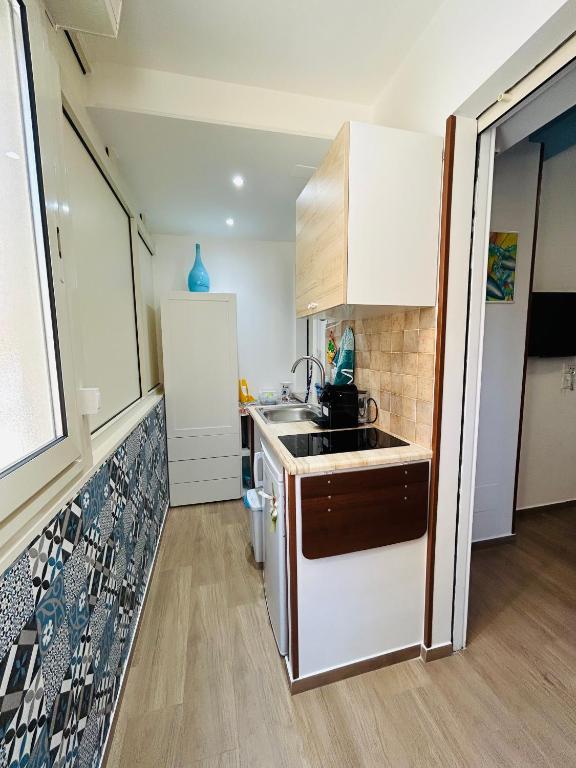 Kuchyňa alebo kuchynka v ubytovaní SicilyHouse Palermo