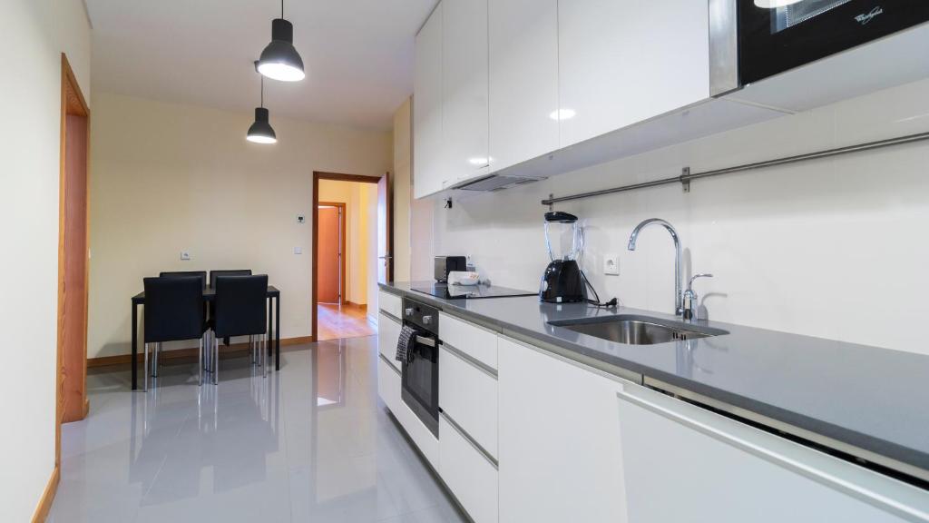 Kuchyň nebo kuchyňský kout v ubytování Bento Living by LovelyStay