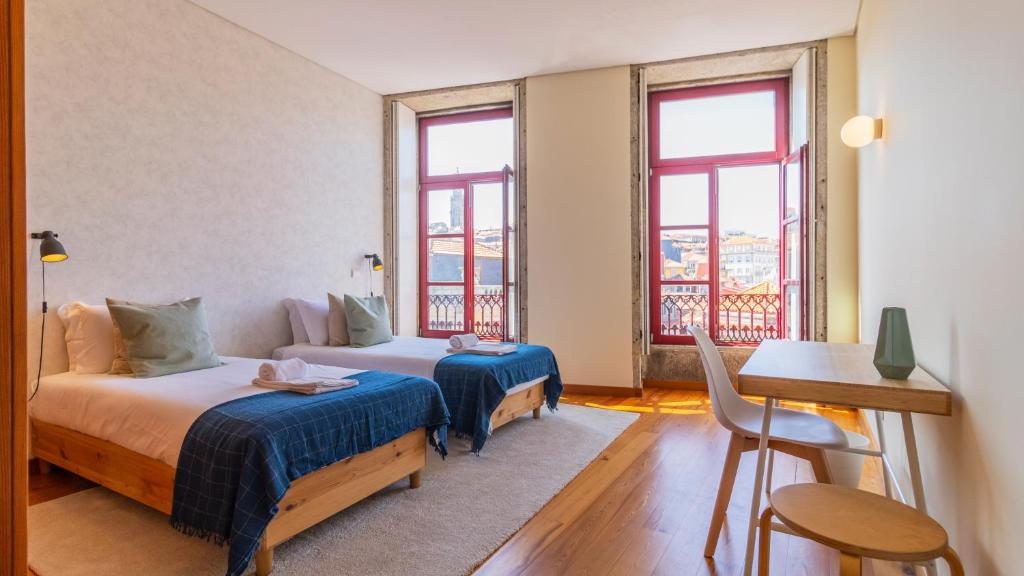Postel nebo postele na pokoji v ubytování Bento Living by LovelyStay