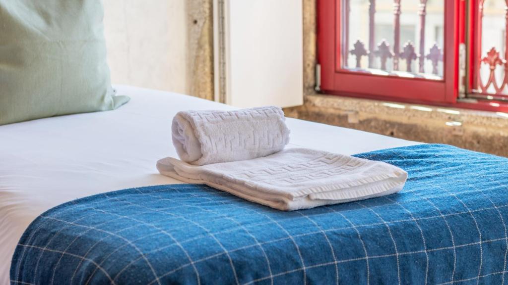 Postel nebo postele na pokoji v ubytování Bento Living by LovelyStay