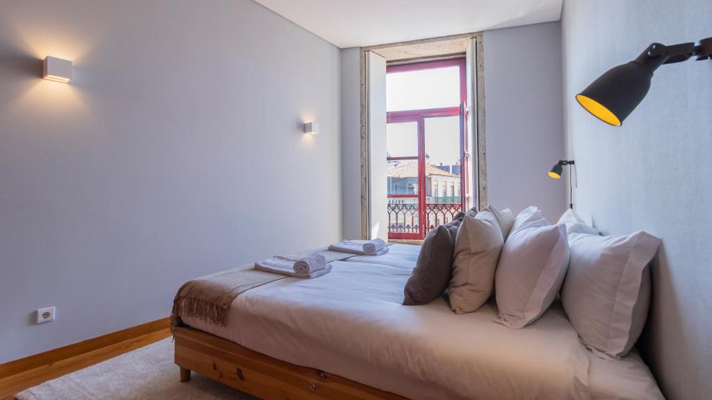 Postel nebo postele na pokoji v ubytování Bento Living by LovelyStay