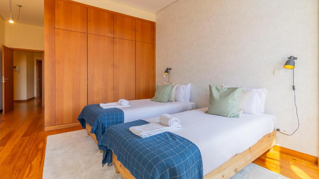 Postel nebo postele na pokoji v ubytování Bento Living by LovelyStay