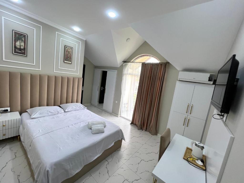 Postel nebo postele na pokoji v ubytování Four Seasons Hotel