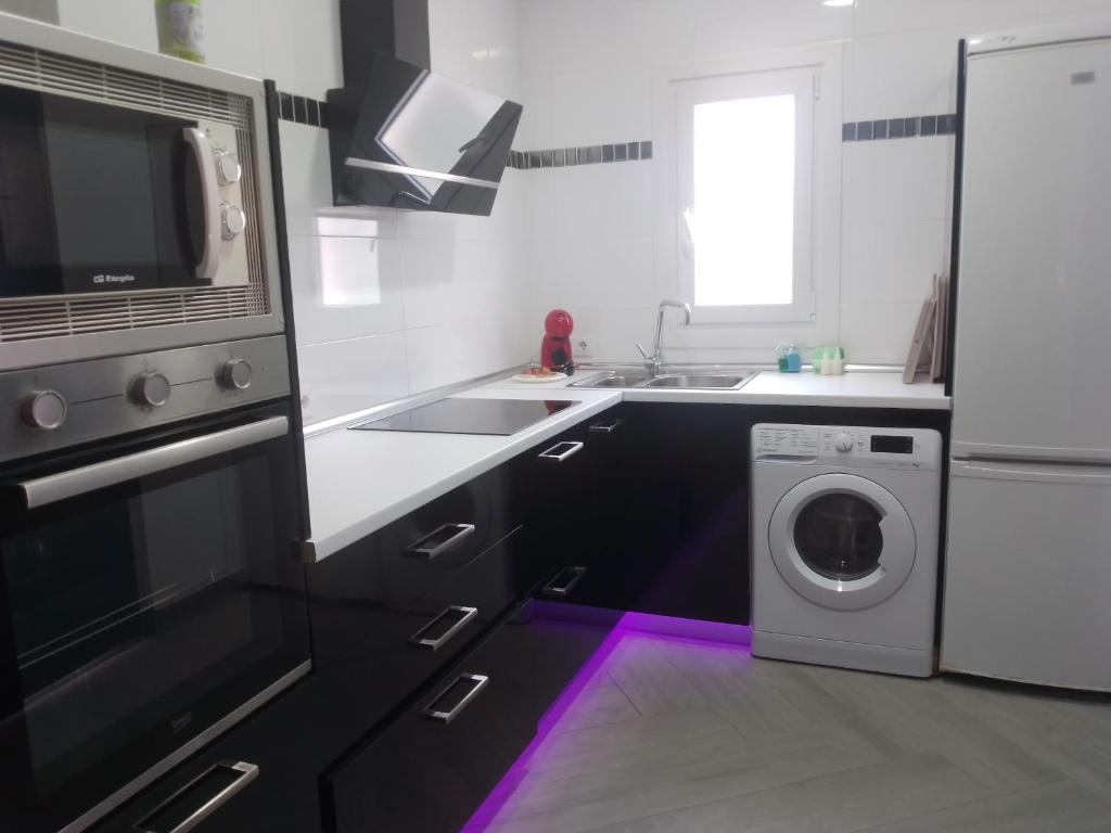 Kuchnia lub aneks kuchenny w obiekcie Apartamento relax con piscina y jacussy spa