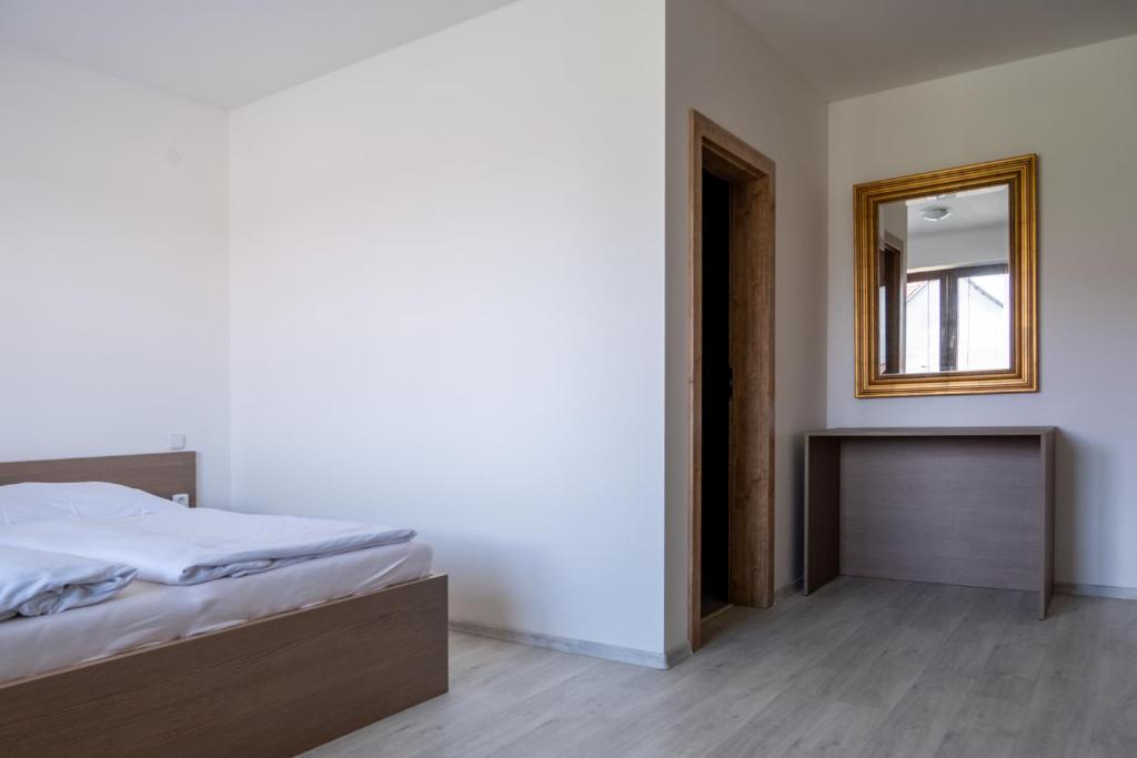 Postel nebo postele na pokoji v ubytování Penzion Tonička
