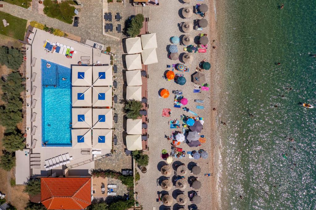an overhead view of a beach with a group of hotels at Hotel Dobrovit in Baška