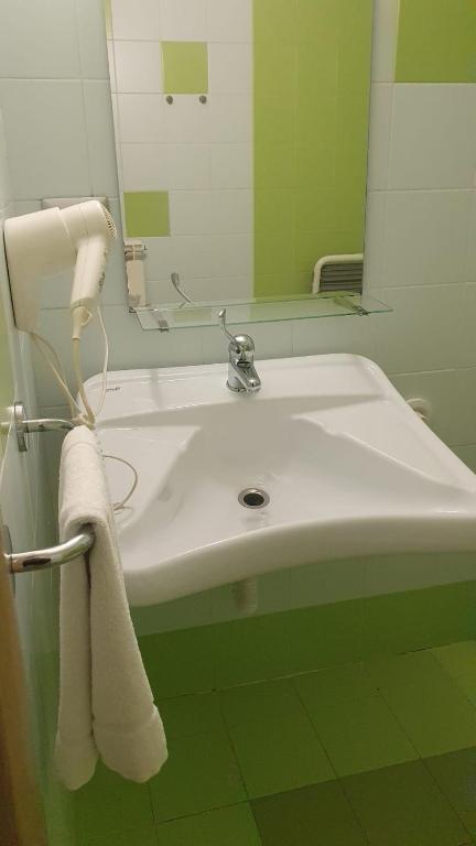 Koupelna v ubytování Hotel Sharing
