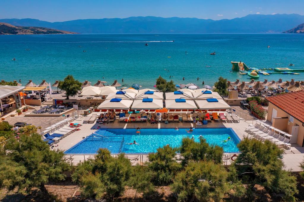 an aerial view of a resort with a swimming pool at Hotel Dobrovit in Baška