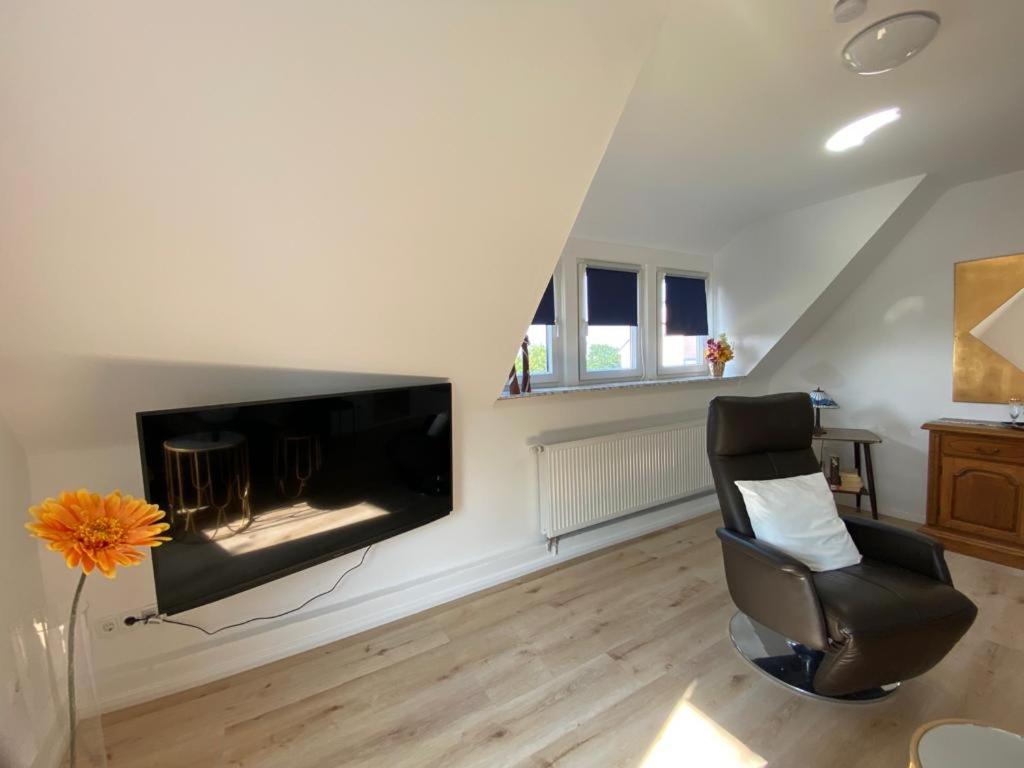 TV a/nebo společenská místnost v ubytování Haus Sunshine - Ferienwohnung Sunshine 1