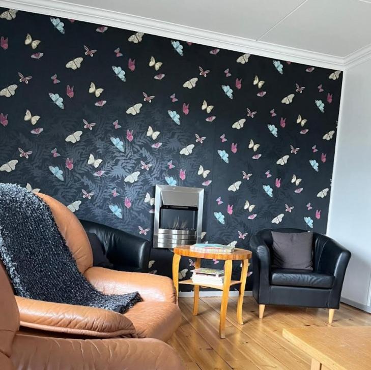 Posezení v ubytování Blåsbocka, lägenhet i hus 3 rok
