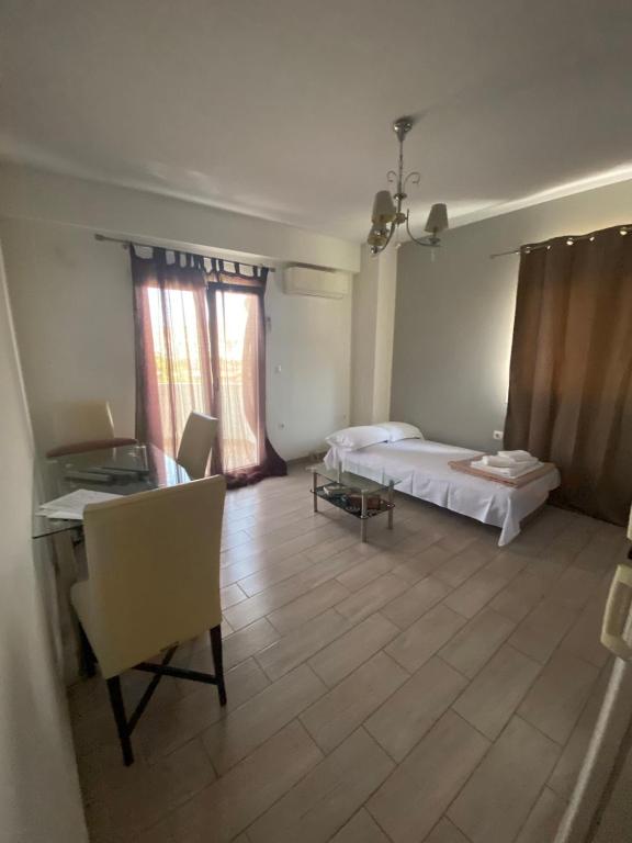 Postel nebo postele na pokoji v ubytování Arethousa Fourth Floor
