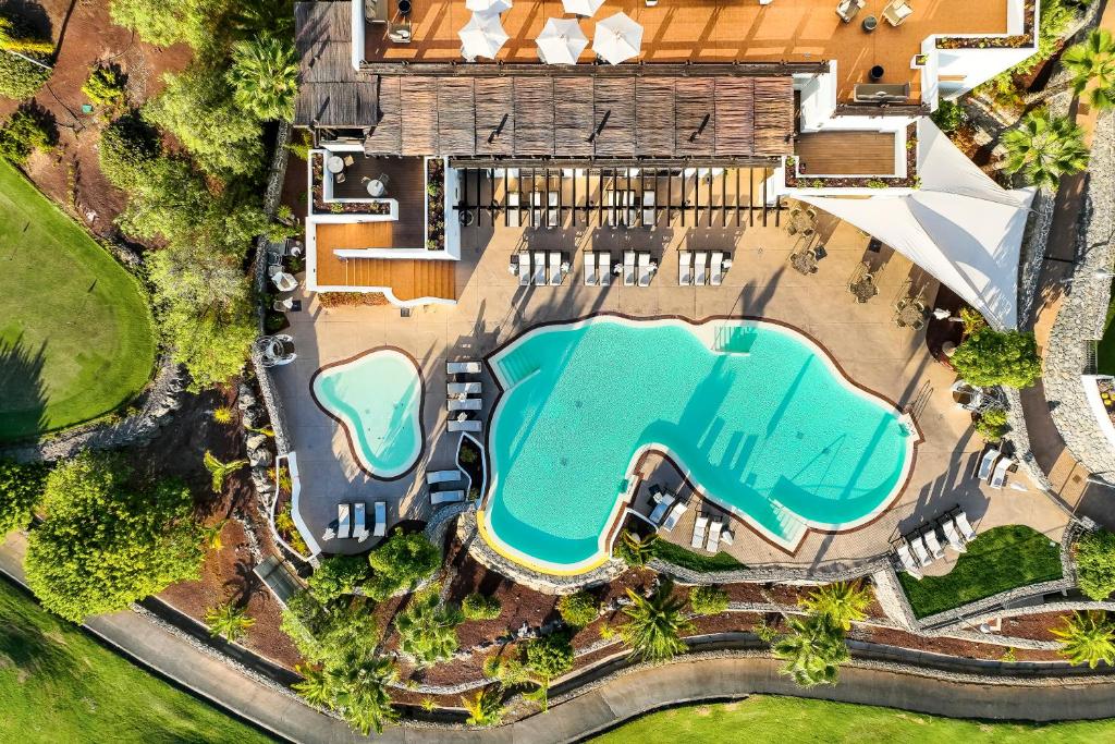an overhead view of a swimming pool in a house at Las Terrazas de Abama Suites in Guía de Isora