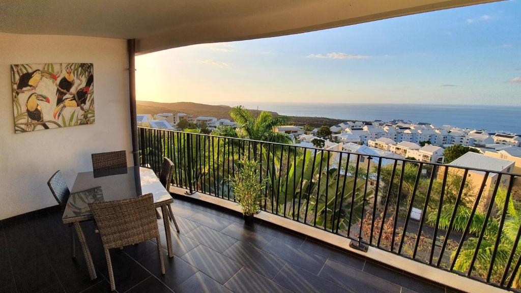 a balcony with a view of the ocean at Le Panorama in Fleurimont