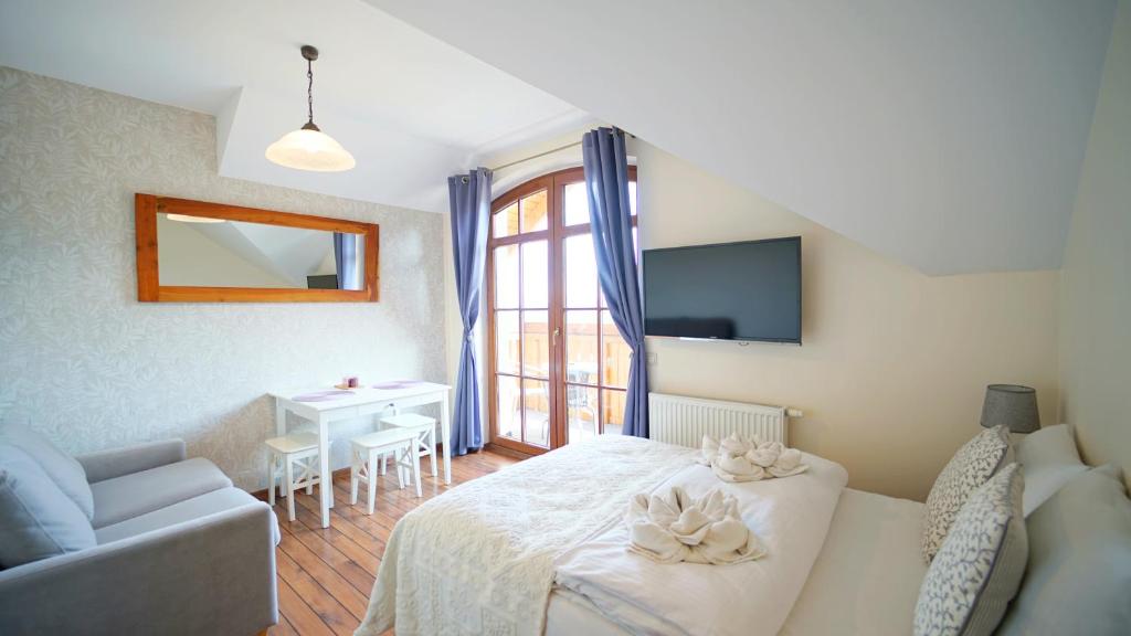 Posteľ alebo postele v izbe v ubytovaní Apartamenty EverySky - Obrońców Pokoju 1D