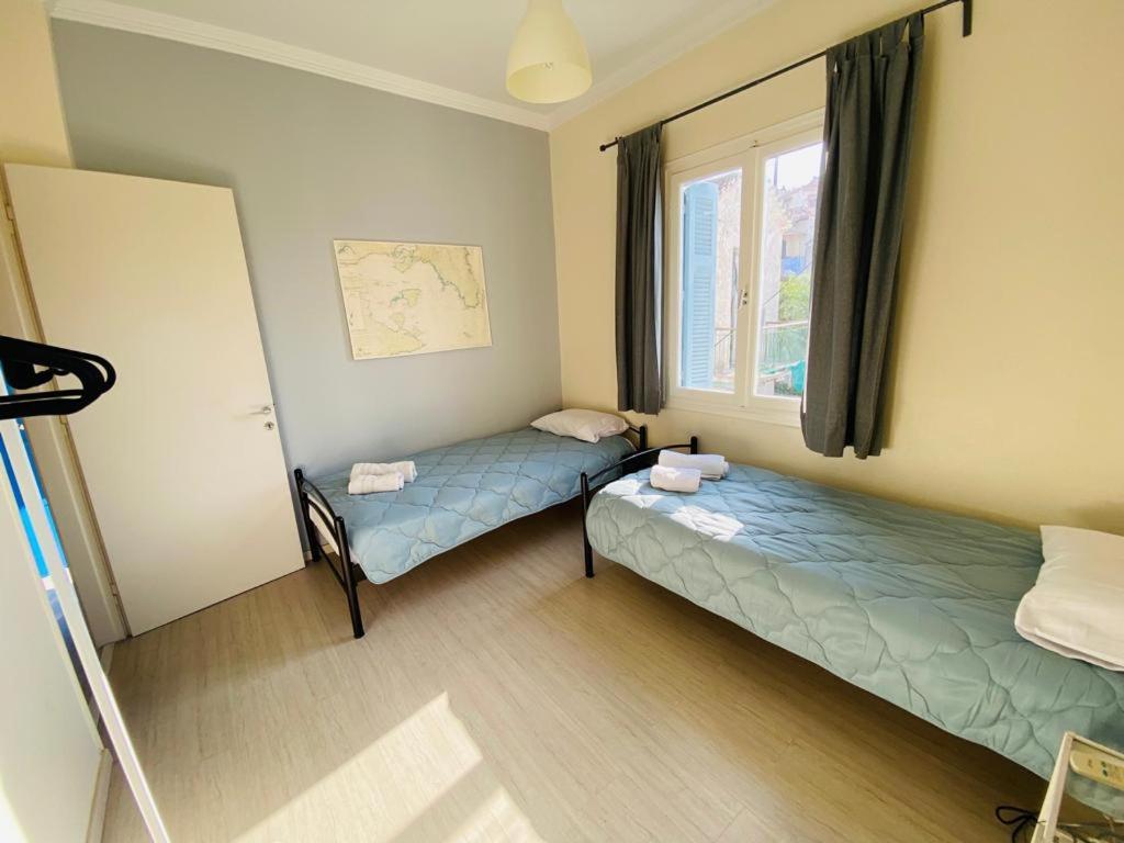 Postel nebo postele na pokoji v ubytování ISLAND HOUSE