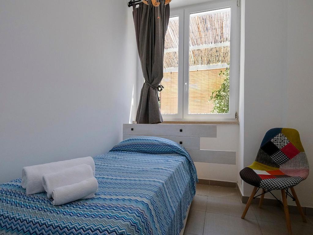 Łóżko lub łóżka w pokoju w obiekcie Numero20 B&B