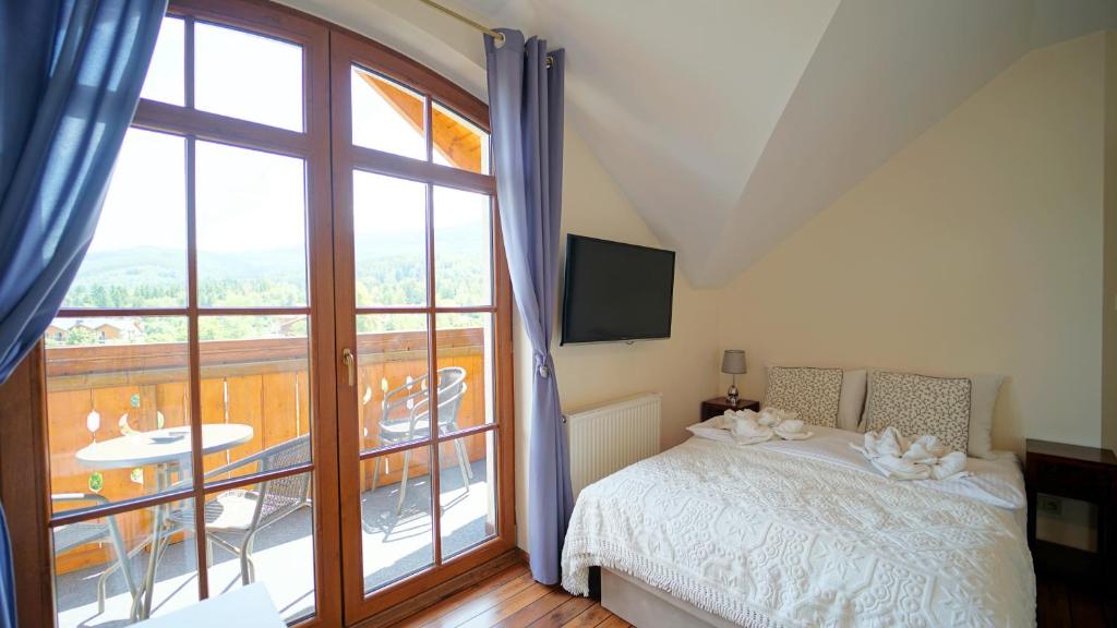 Posteľ alebo postele v izbe v ubytovaní Apartamenty EverySky - Obrońców Pokoju 1D