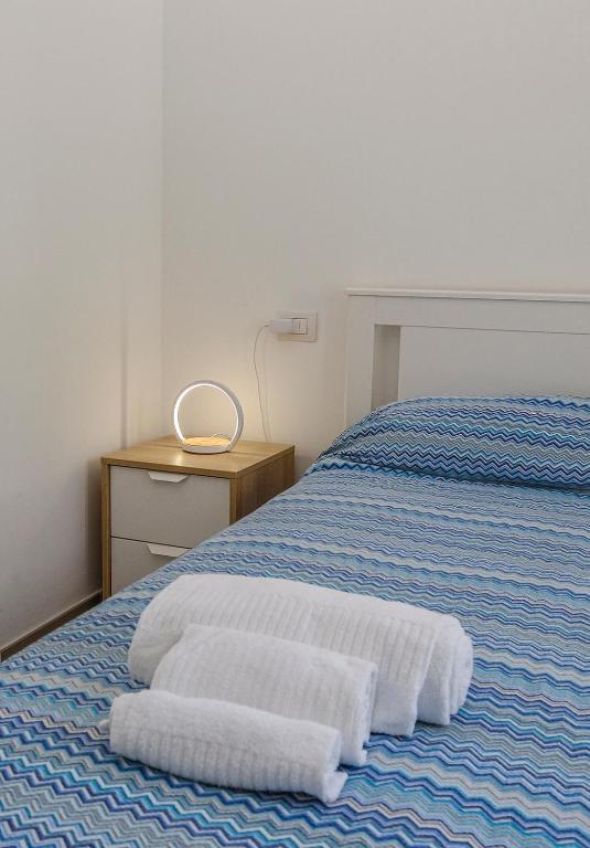 Łóżko lub łóżka w pokoju w obiekcie Numero20 B&B