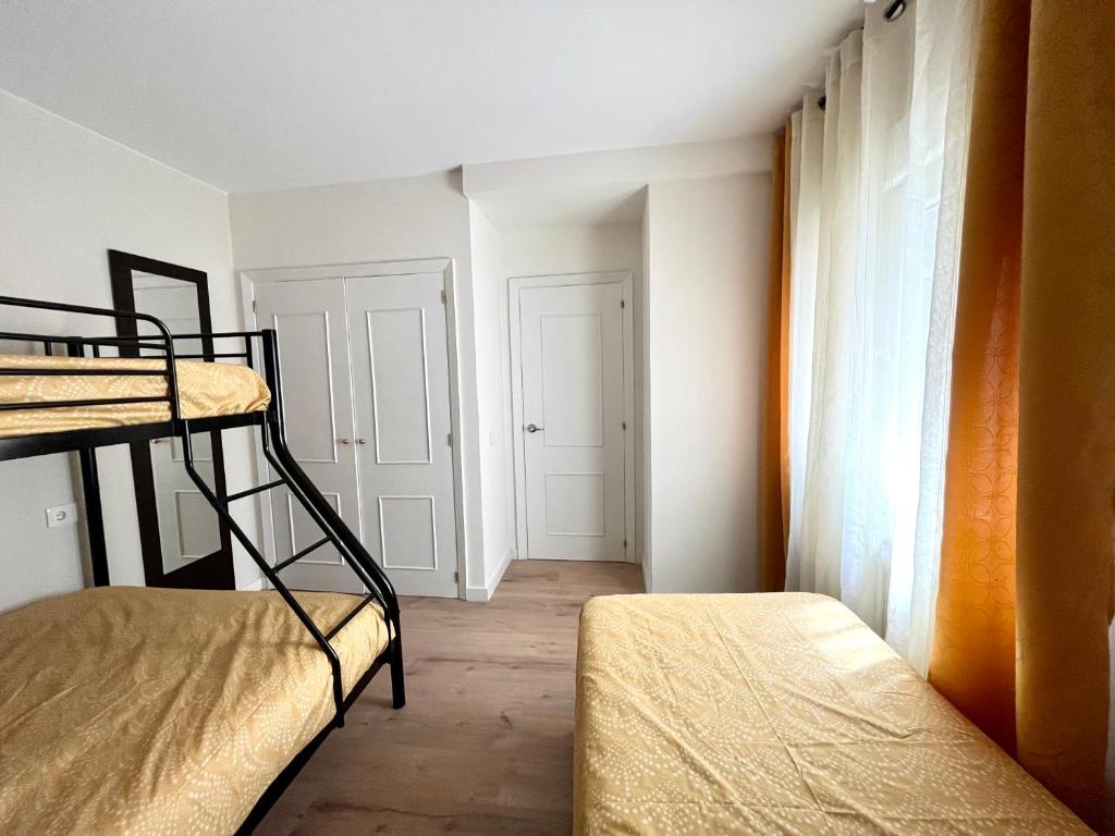 Letto o letti in una camera di Casa A Guarda