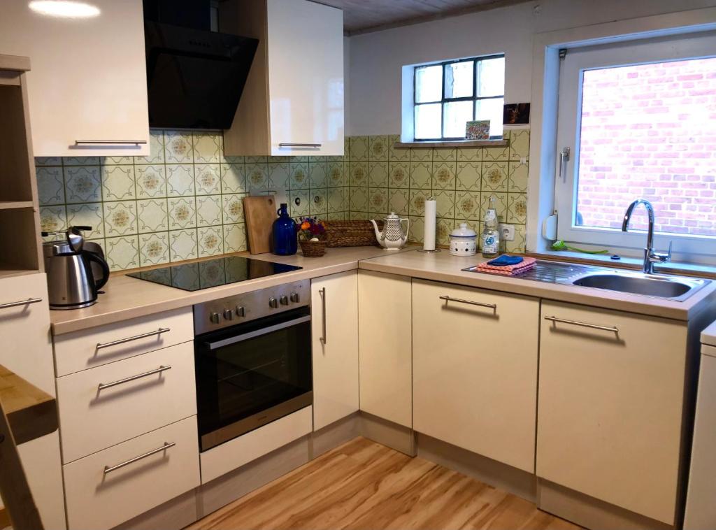 Kuchyň nebo kuchyňský kout v ubytování Ferienwohnung Elbsegler