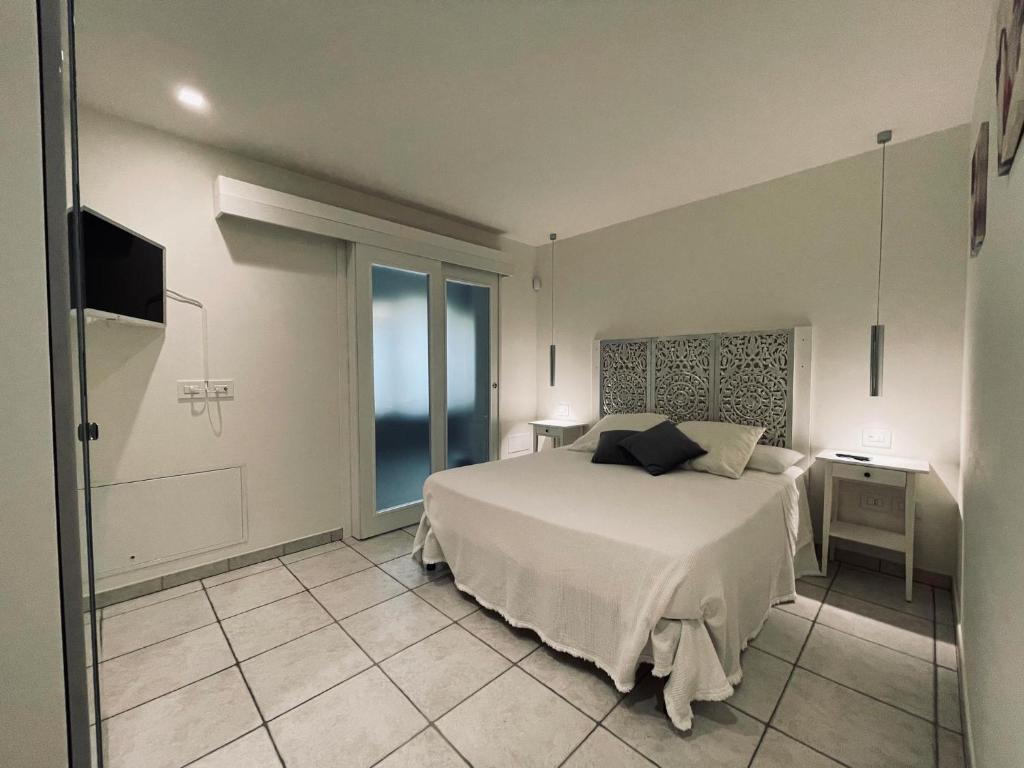 Postel nebo postele na pokoji v ubytování Agriturismo BioCore 2 - Colledoro