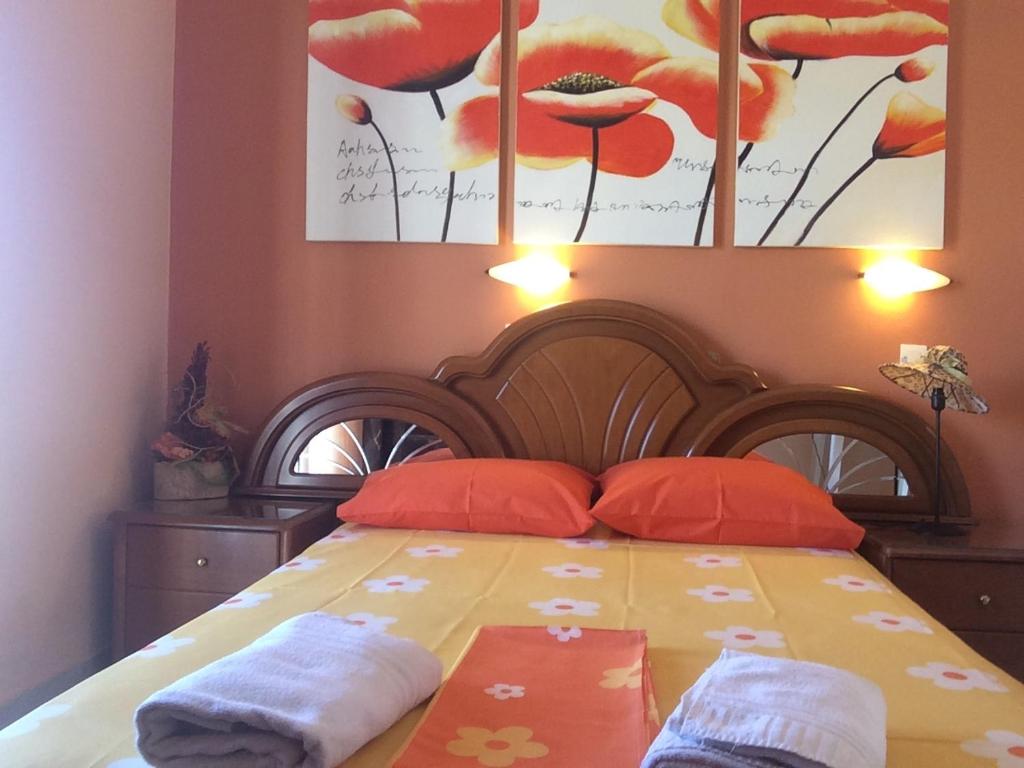 Ein Bett oder Betten in einem Zimmer der Unterkunft Athina Studios