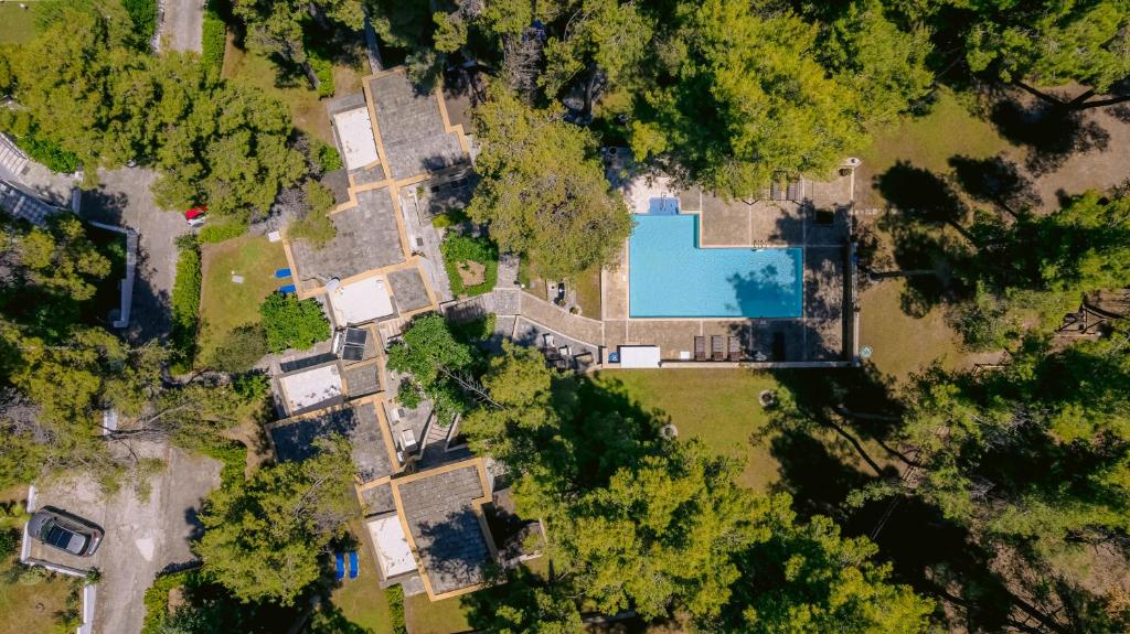 an aerial view of a house with a pool at Sani Cape Shared Pool Villas in Sani Beach