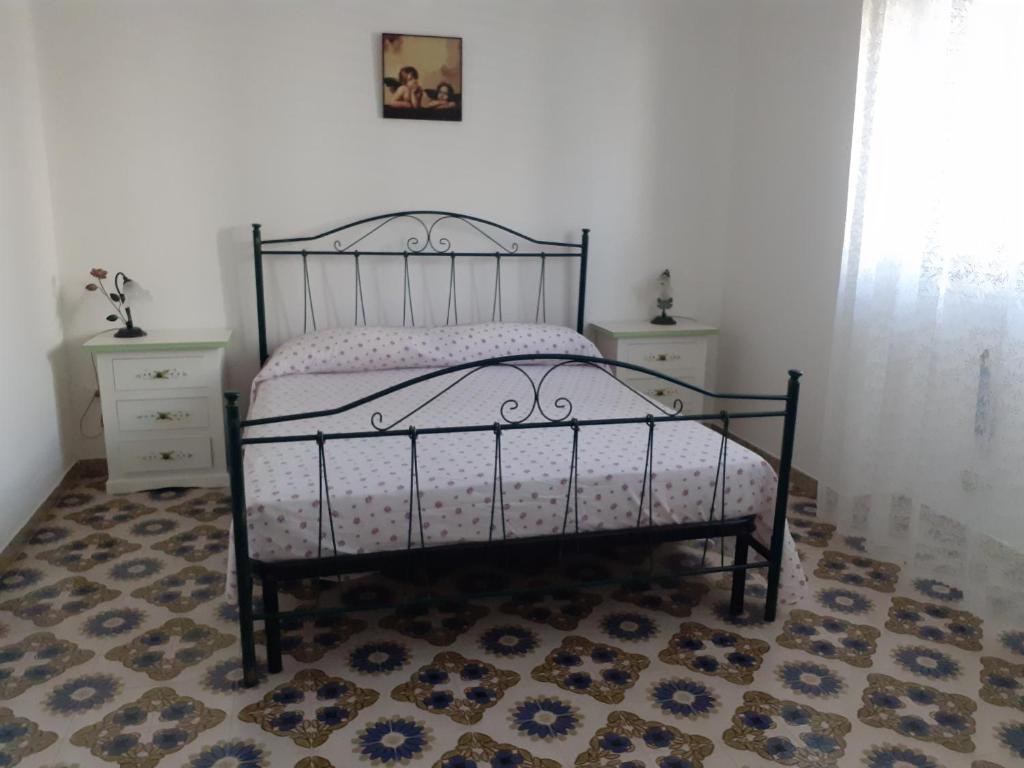 Säng eller sängar i ett rum på Casa Rosa 12 beds a few minutes from Leuca, Castro Otranto Gallipoli Torrevado